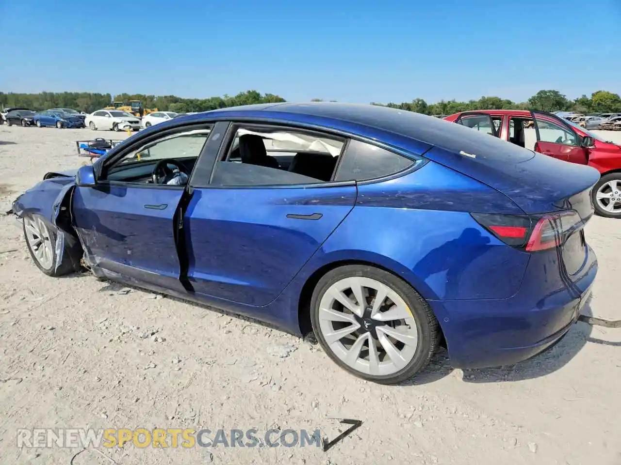 2 fotografías del automóvil dañado 5YJ3E1EA4NF192103 TESLA MODEL 3 2022
