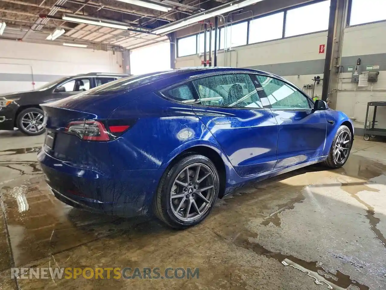 3 Photograph of a damaged car 5YJ3E1EA4NF289236 TESLA MODEL 3 2022
