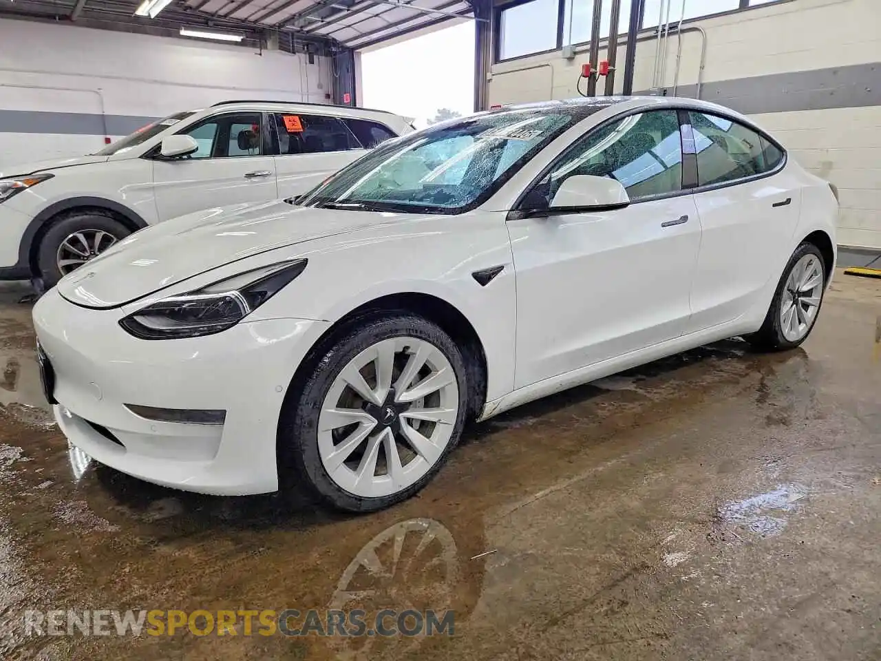 1 Photograph of a damaged car 5YJ3E1EA4NF304799 TESLA MODEL 3 2022