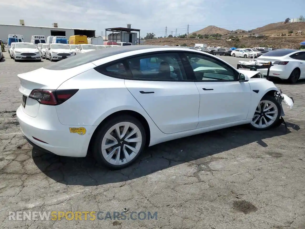 3 Photograph of a damaged car 5YJ3E1EA5NF199920 TESLA MODEL 3 2022