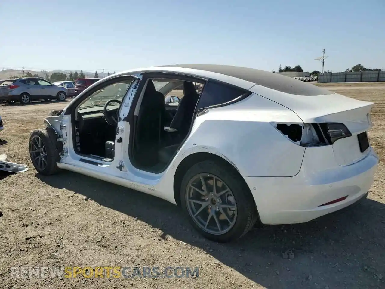 2 Photograph of a damaged car 5YJ3E1EA5NF243091 TESLA MODEL 3 2022