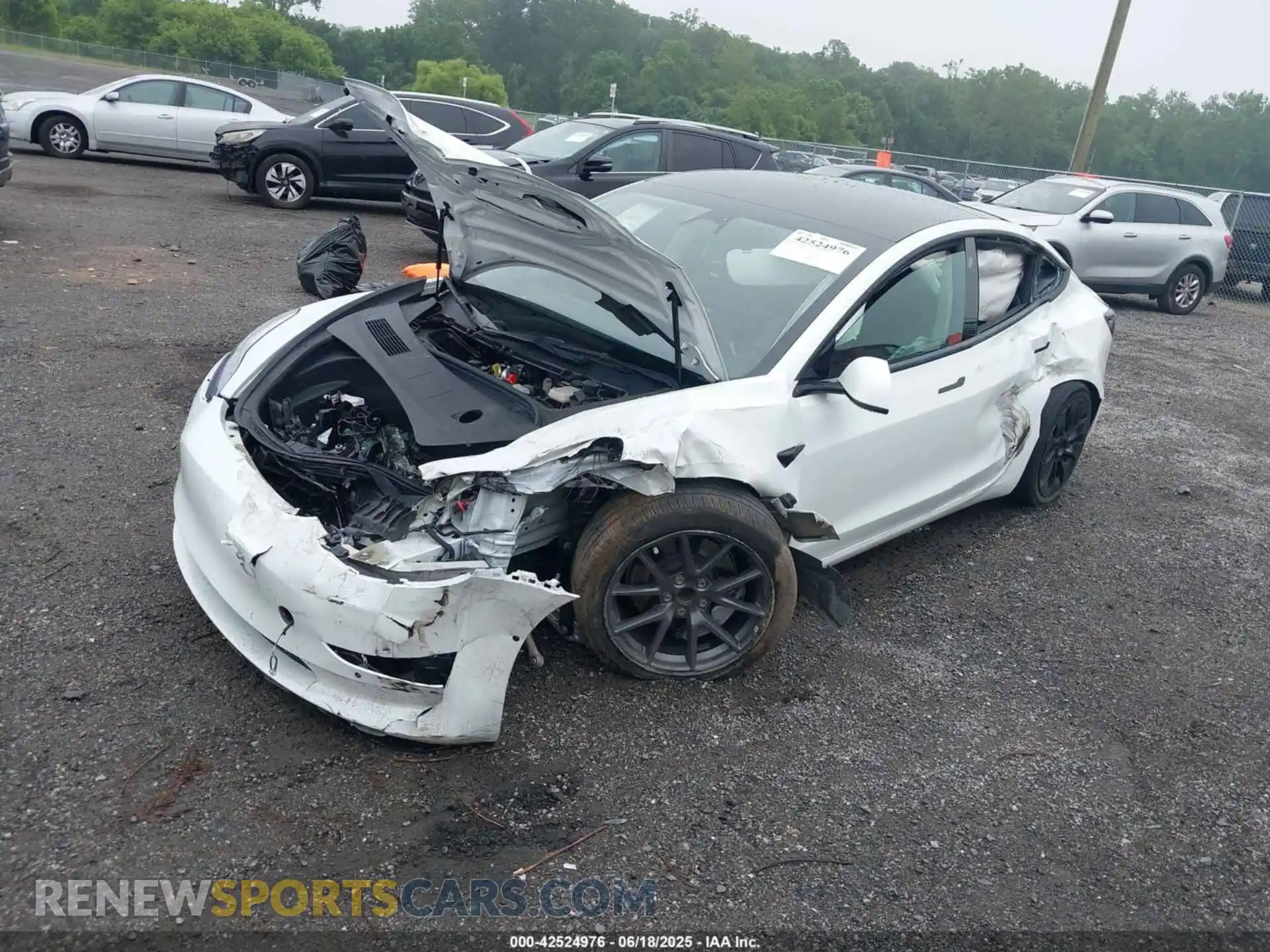 2 Photograph of a damaged car 5YJ3E1EA5NF305301 TESLA MODEL 3 2022