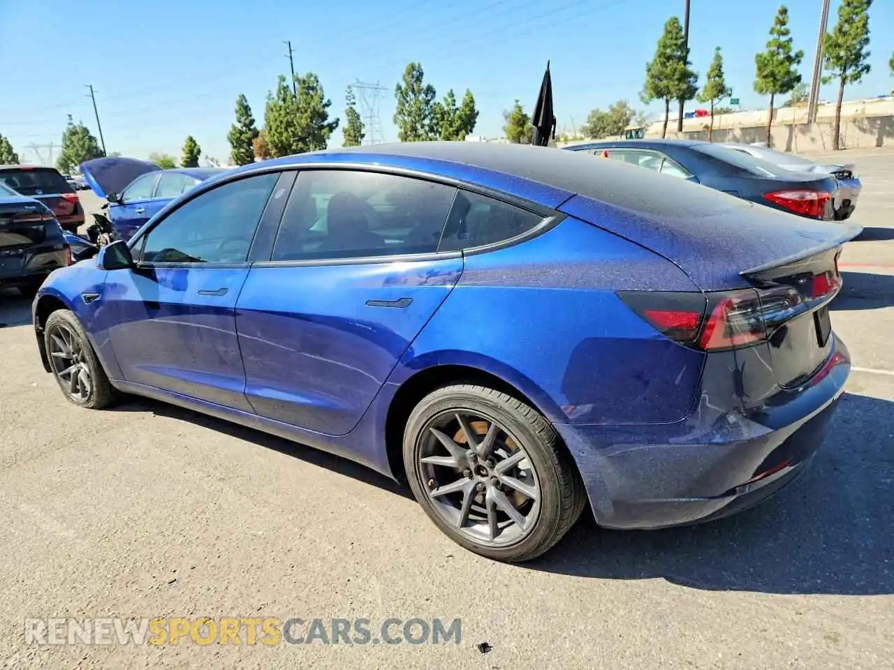 2 Photograph of a damaged car 5YJ3E1EA5NF306481 TESLA MODEL 3 2022