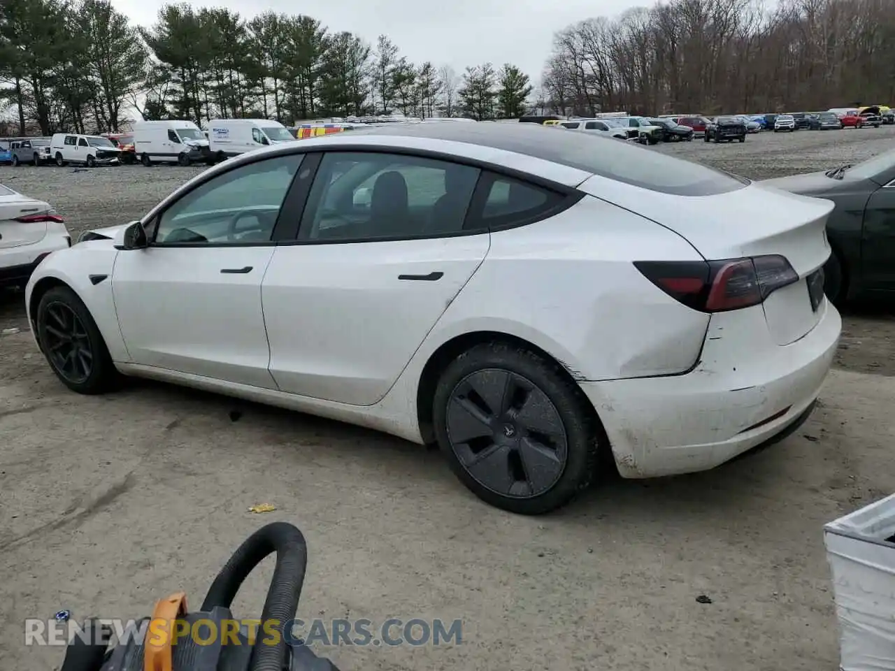 2 Photograph of a damaged car 5YJ3E1EA5NF324625 TESLA MODEL 3 2022