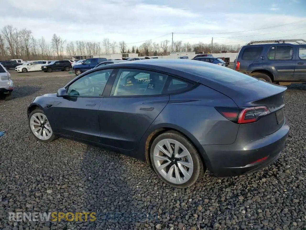 2 Photograph of a damaged car 5YJ3E1EA5NF370665 TESLA MODEL 3 2022