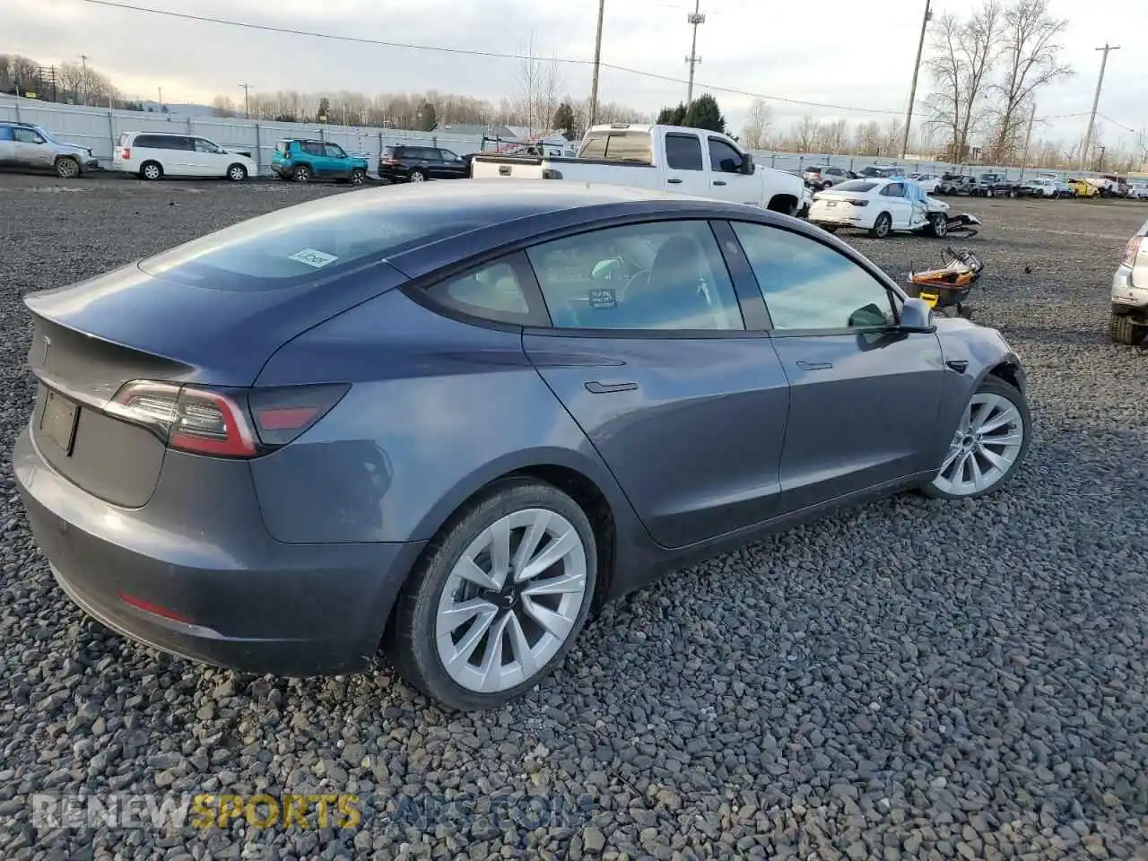 3 Photograph of a damaged car 5YJ3E1EA5NF370665 TESLA MODEL 3 2022