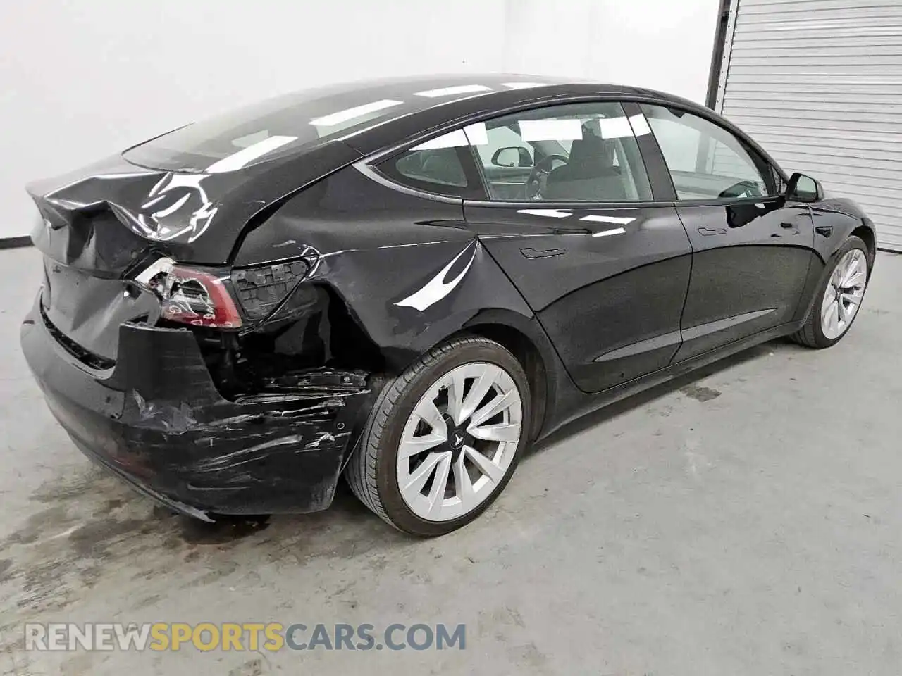 3 Photograph of a damaged car 5YJ3E1EA5NF372092 TESLA MODEL 3 2022