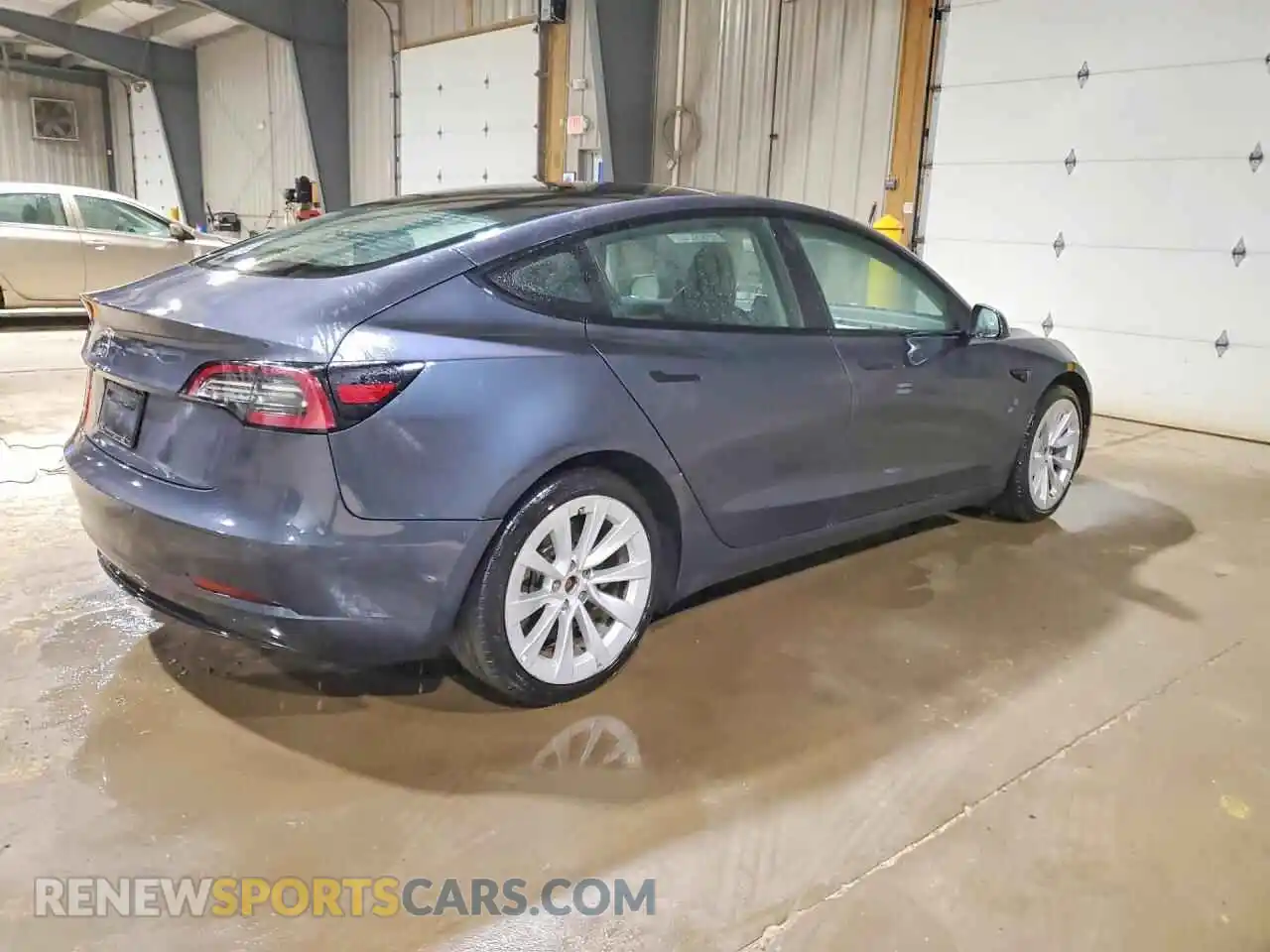 3 Photograph of a damaged car 5YJ3E1EA5NF372125 TESLA MODEL 3 2022