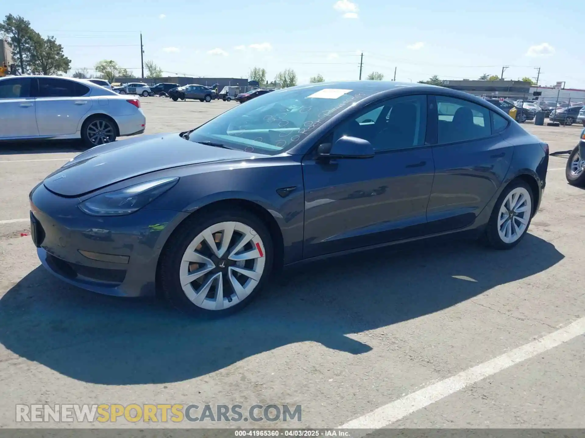 2 Photograph of a damaged car 5YJ3E1EA6NF144098 TESLA MODEL 3 2022