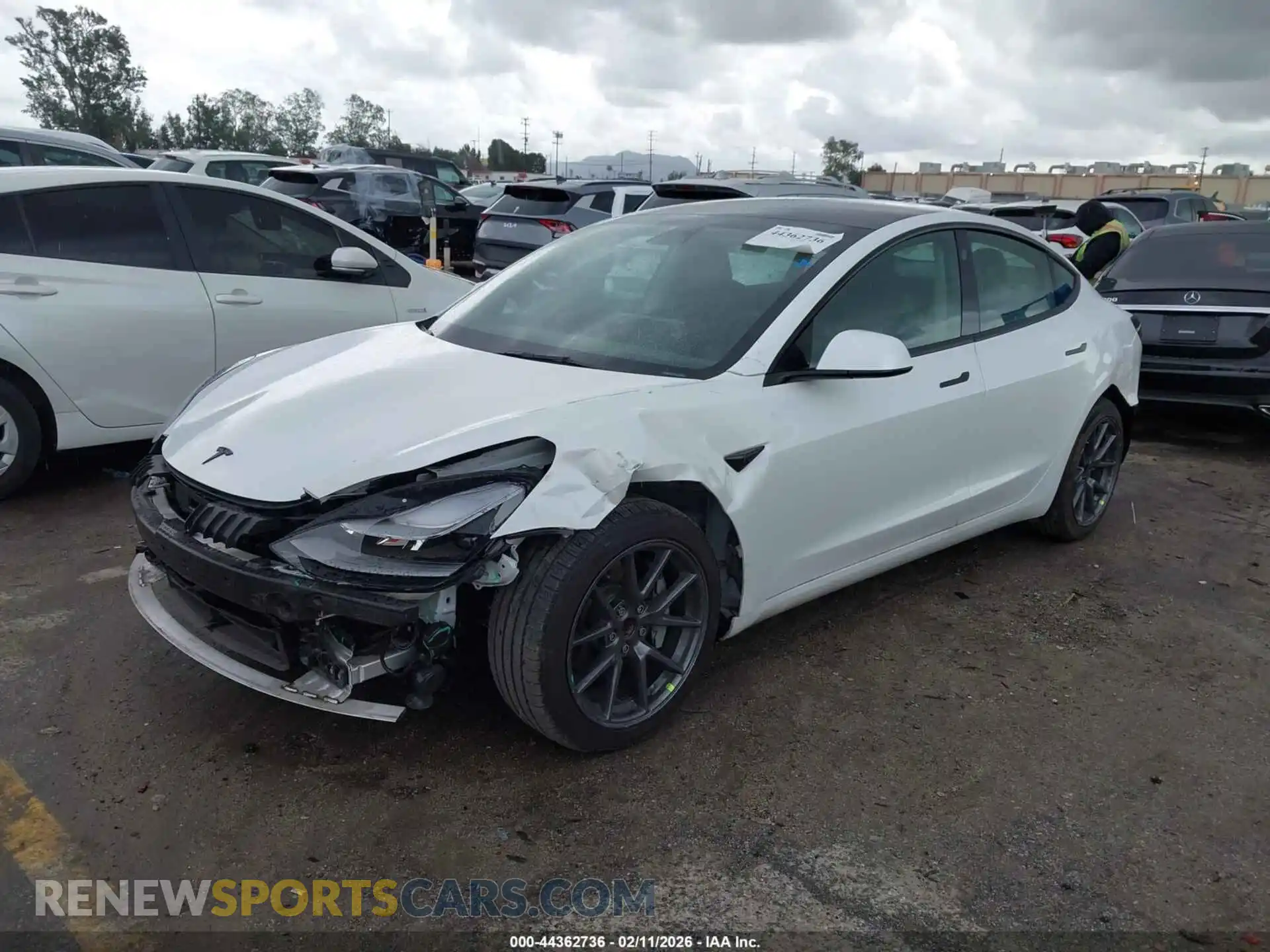 2 Photograph of a damaged car 5YJ3E1EA6NF192930 TESLA MODEL 3 2022