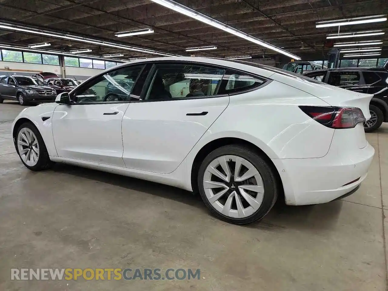 2 Photograph of a damaged car 5YJ3E1EA6NF287875 TESLA MODEL 3 2022