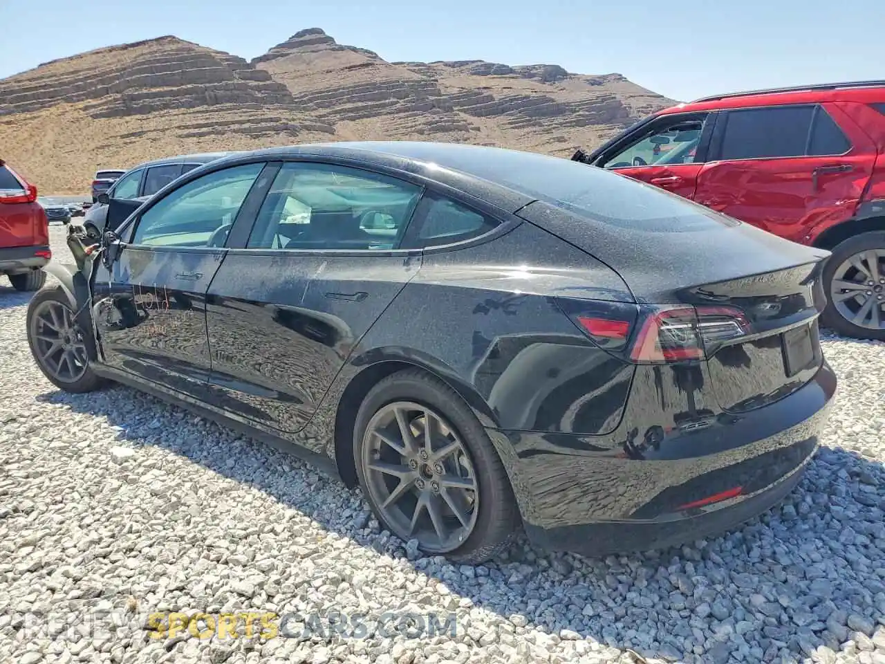 2 fotografías del automóvil dañado 5YJ3E1EA6NF301855 TESLA MODEL 3 2022