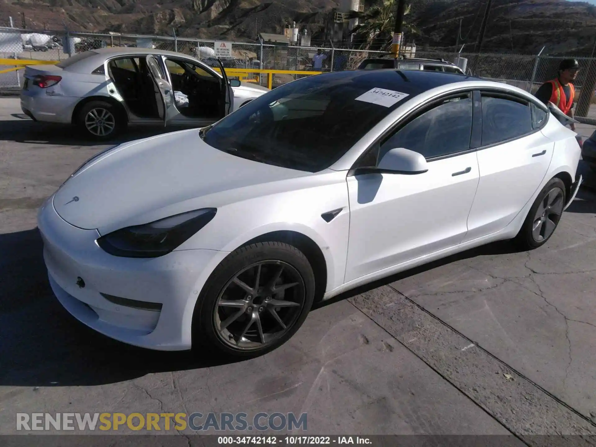 2 Photograph of a damaged car 5YJ3E1EA6NF322348 TESLA MODEL 3 2022