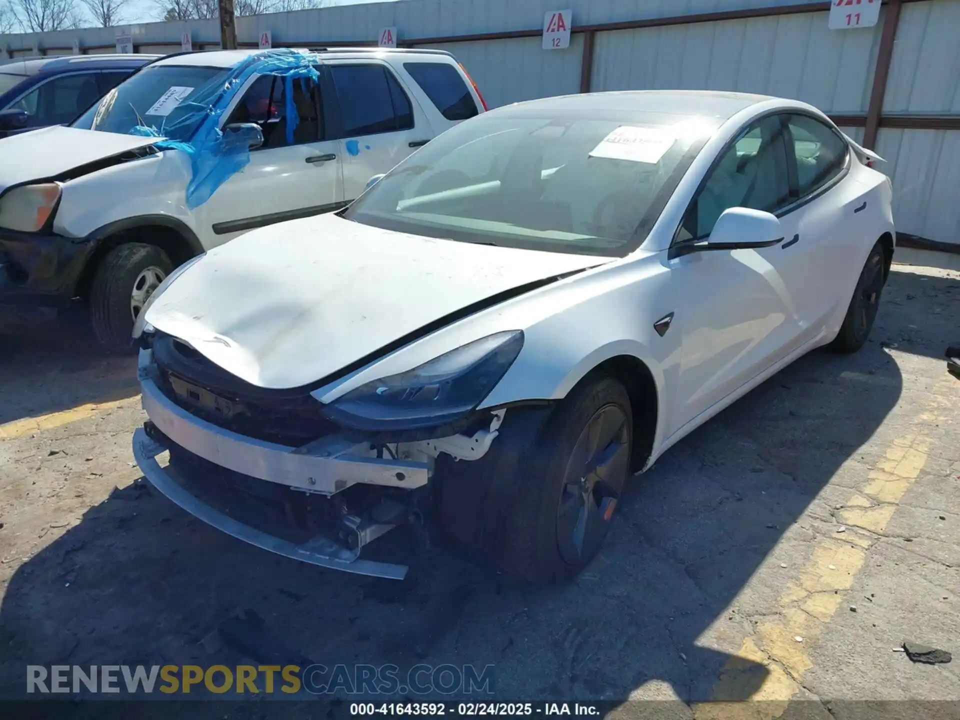 2 Photograph of a damaged car 5YJ3E1EA7NF103513 TESLA MODEL 3 2022