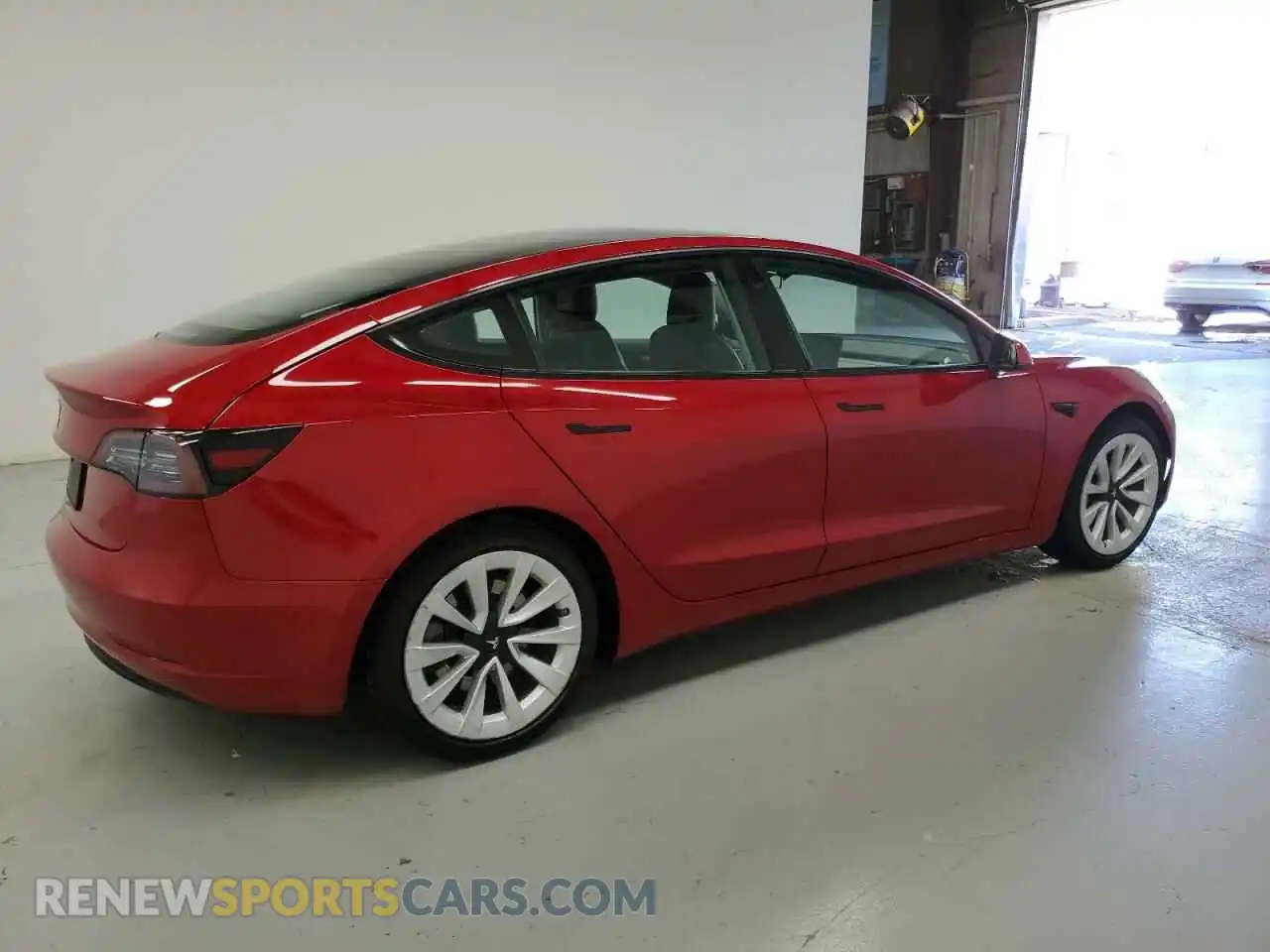 3 Photograph of a damaged car 5YJ3E1EA7NF188899 TESLA MODEL 3 2022