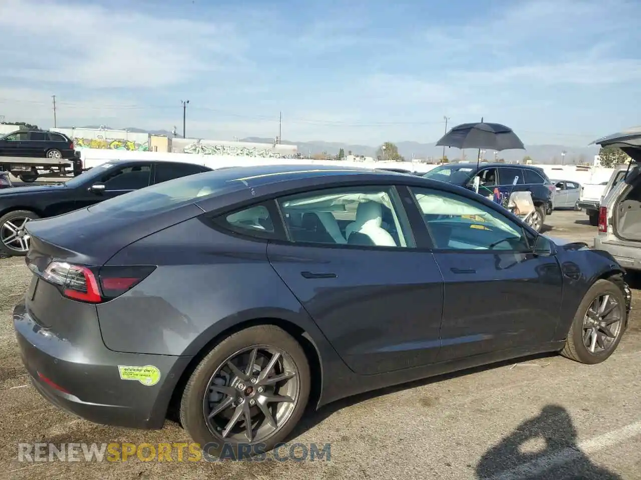 3 Photograph of a damaged car 5YJ3E1EA7NF322150 TESLA MODEL 3 2022