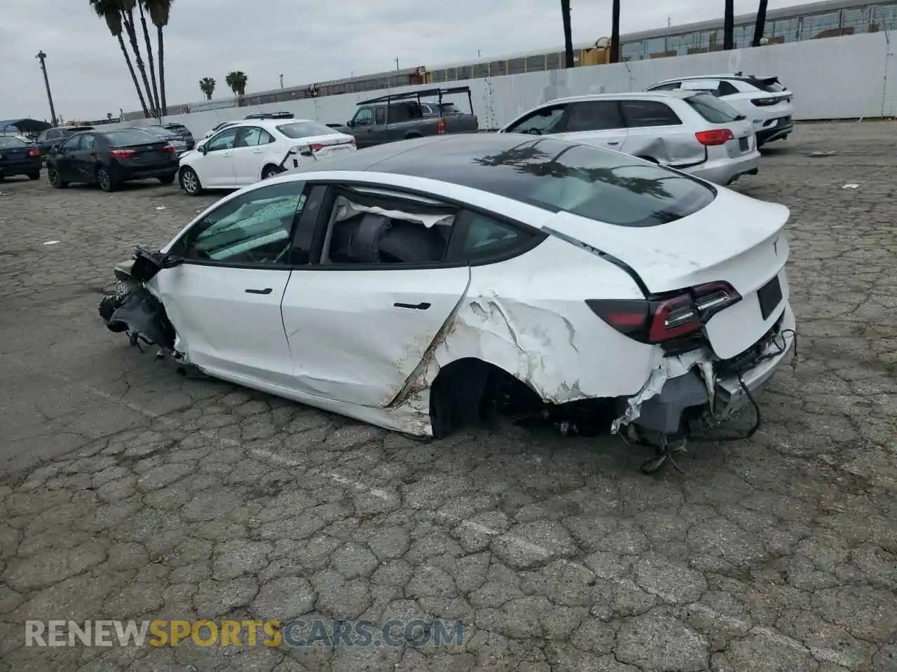 2 fotografías del automóvil dañado 5YJ3E1EA8NF244865 TESLA MODEL 3 2022