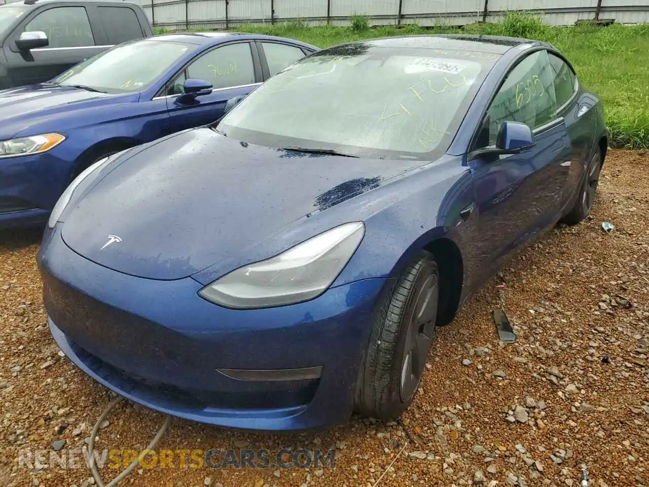 2 Photograph of a damaged car 5YJ3E1EA9NF123469 TESLA MODEL 3 2022