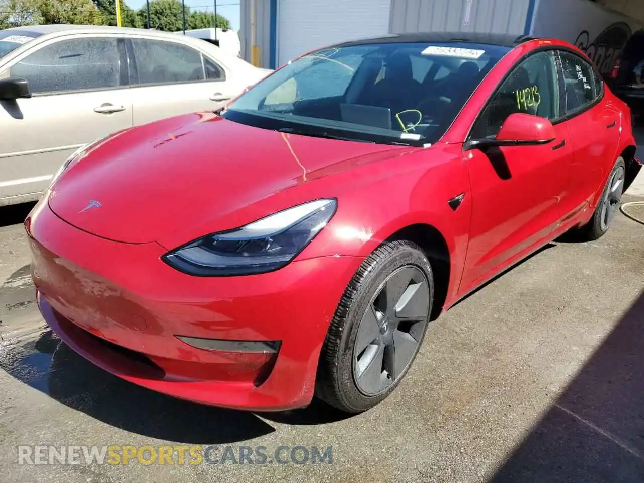 2 Photograph of a damaged car 5YJ3E1EA9NF185261 TESLA MODEL 3 2022