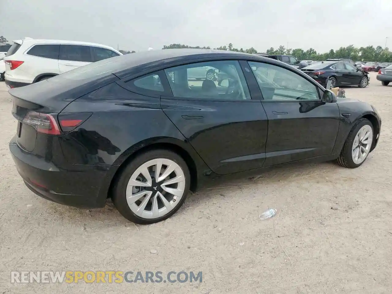 3 Photograph of a damaged car 5YJ3E1EA9NF201815 TESLA MODEL 3 2022