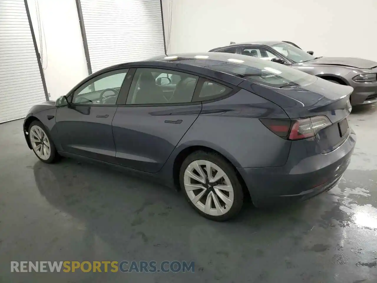 2 Photograph of a damaged car 5YJ3E1EA9NF289121 TESLA MODEL 3 2022