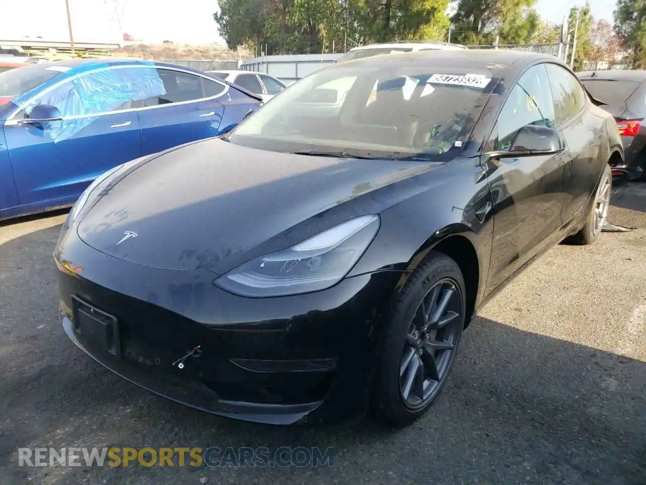 2 Photograph of a damaged car 5YJ3E1EA9NF290060 TESLA MODEL 3 2022