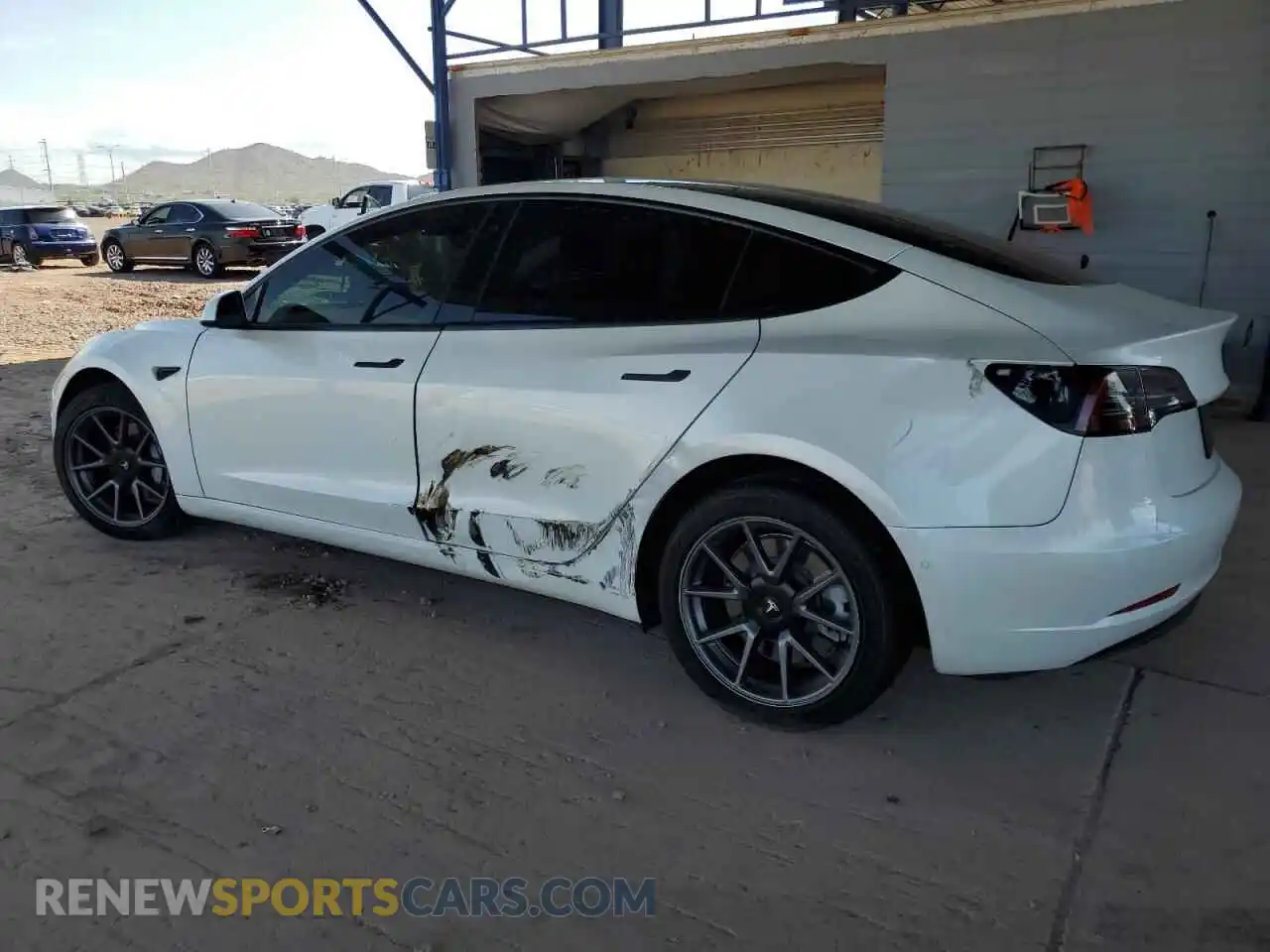 2 Photograph of a damaged car 5YJ3E1EA9NF315488 TESLA MODEL 3 2022