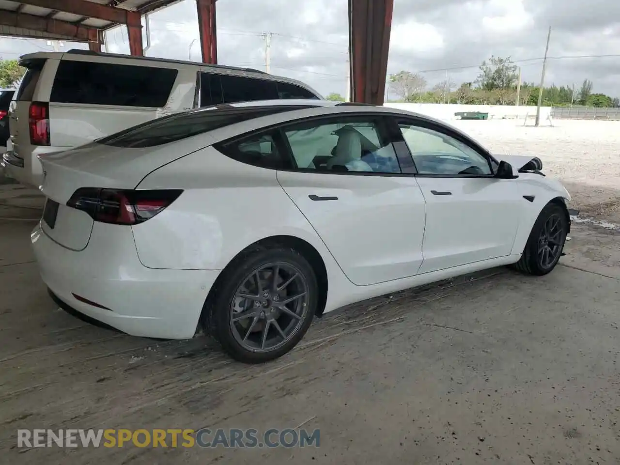 3 Photograph of a damaged car 5YJ3E1EAXNF321803 TESLA MODEL 3 2022