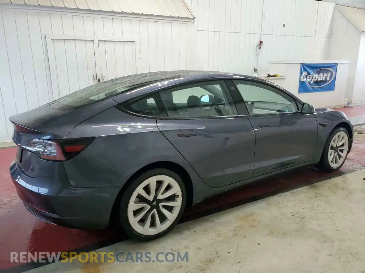 3 Photograph of a damaged car 5YJ3E1EAXNF369690 TESLA MODEL 3 2022