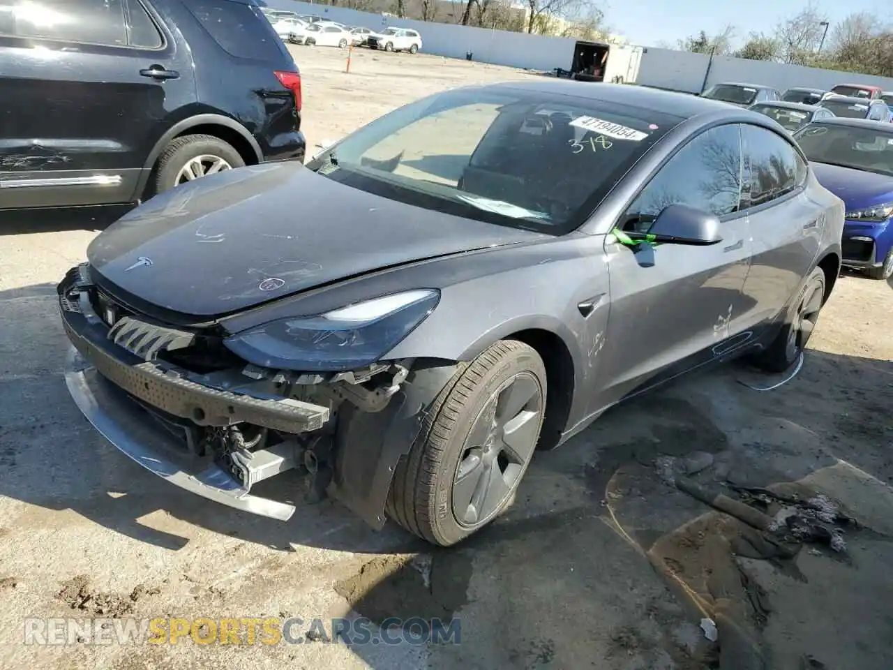 1 Photograph of a damaged car 5YJ3E1EB0NF110974 TESLA MODEL 3 2022