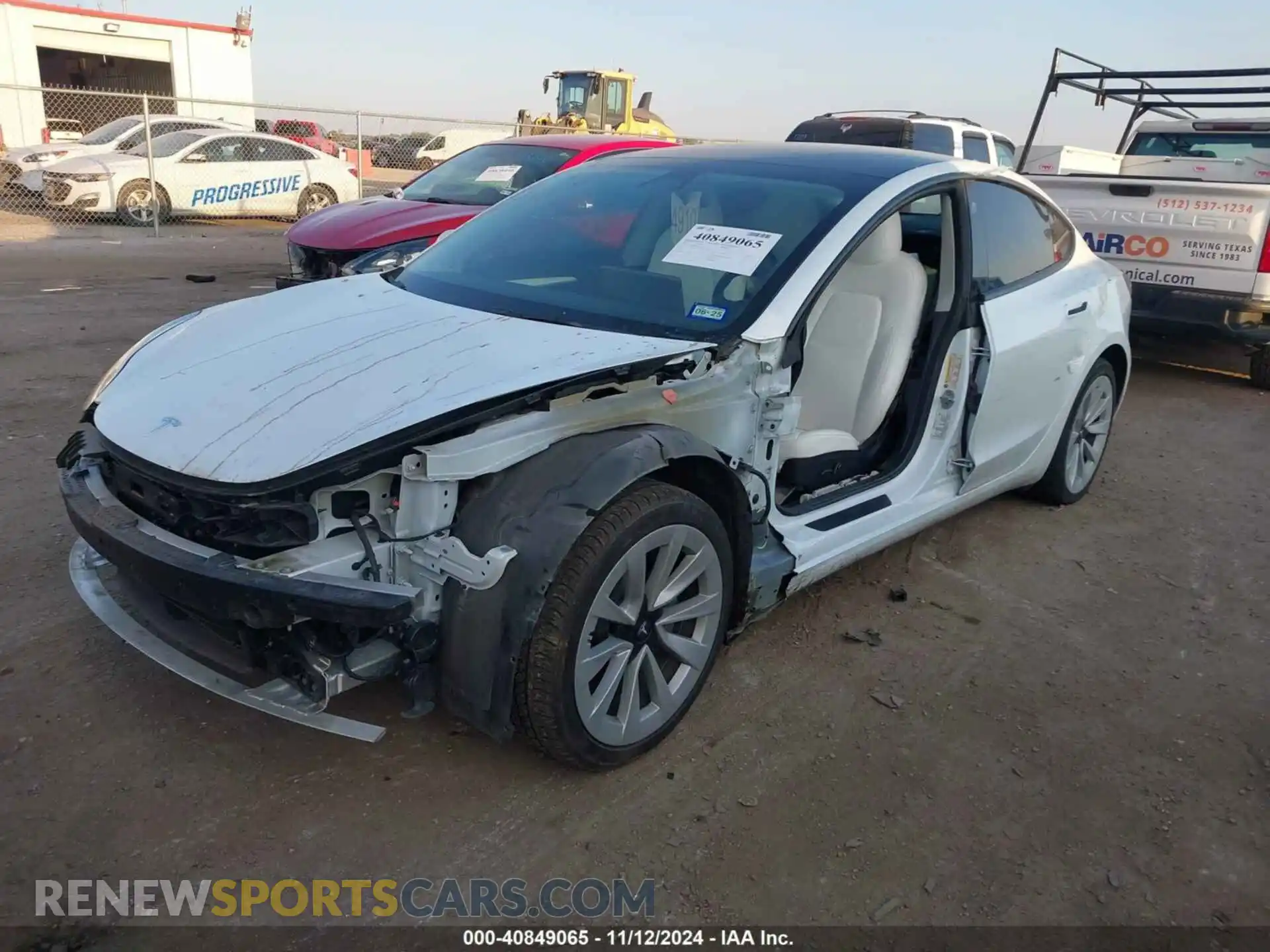 2 Photograph of a damaged car 5YJ3E1EB0NF115284 TESLA MODEL 3 2022