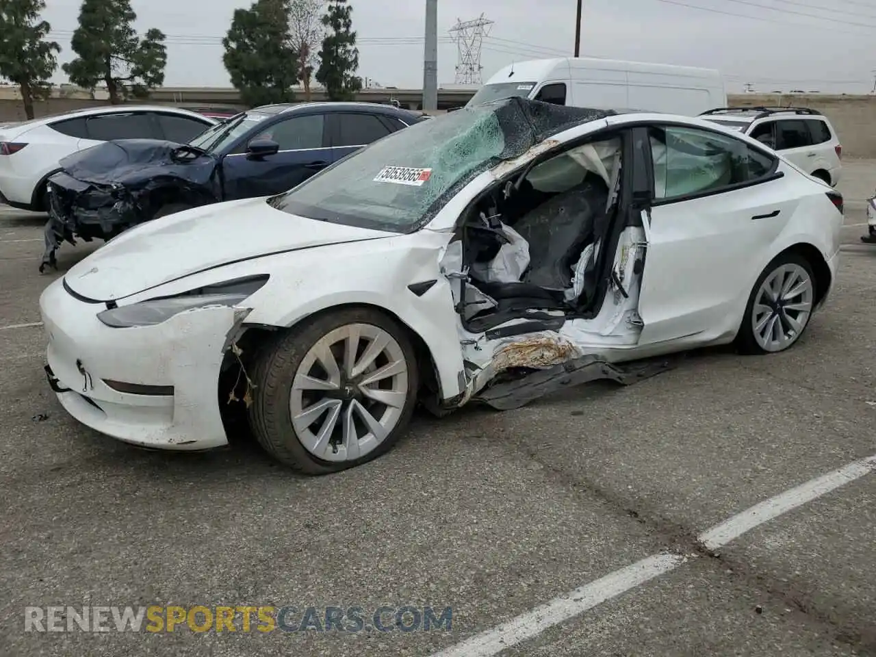 1 Photograph of a damaged car 5YJ3E1EB0NF142551 TESLA MODEL 3 2022
