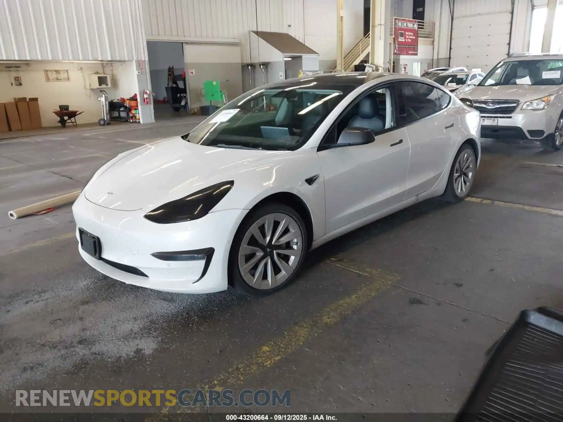 2 Photograph of a damaged car 5YJ3E1EB0NF143943 TESLA MODEL 3 2022