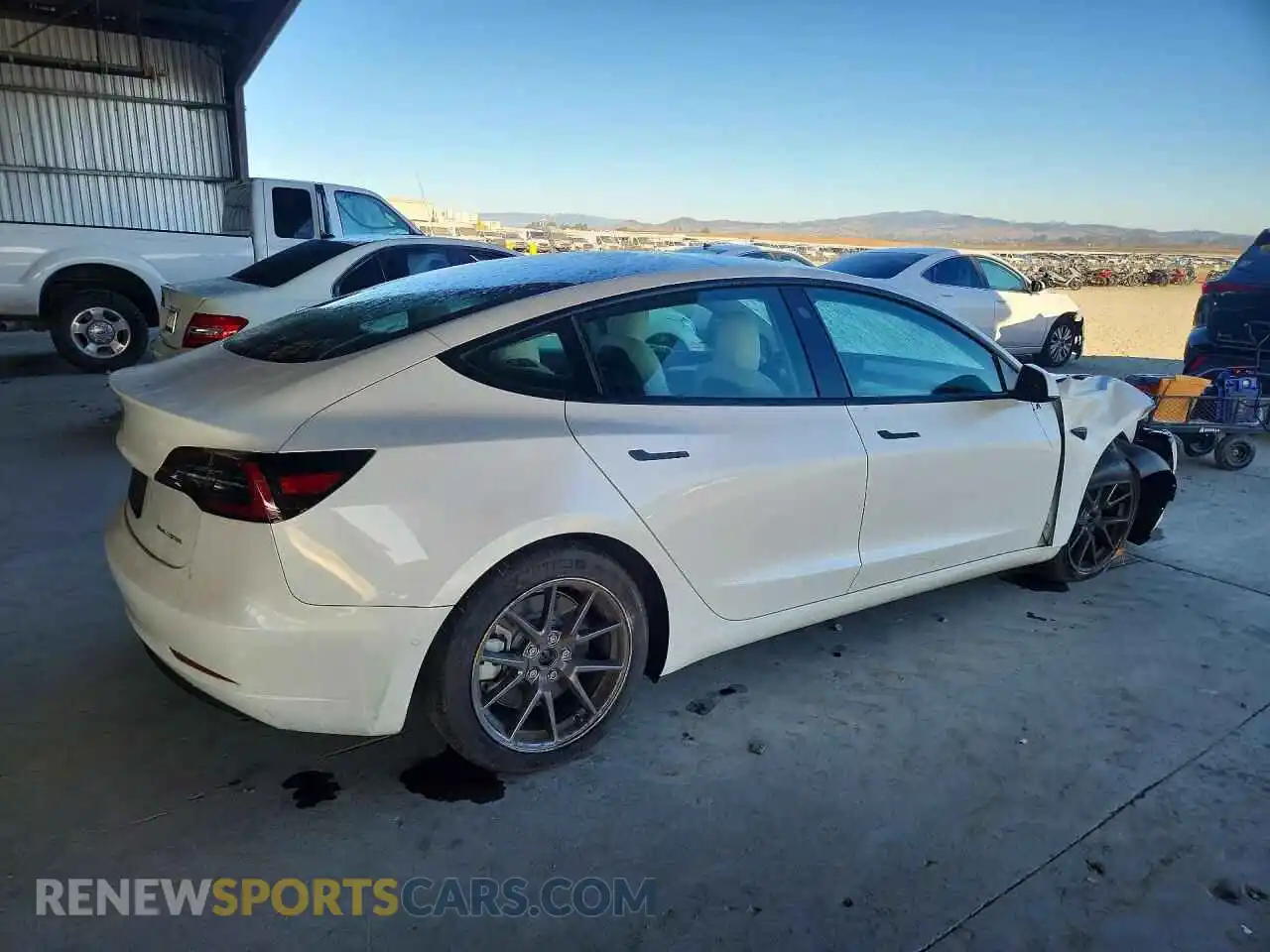 3 Photograph of a damaged car 5YJ3E1EB0NF153646 TESLA MODEL 3 2022