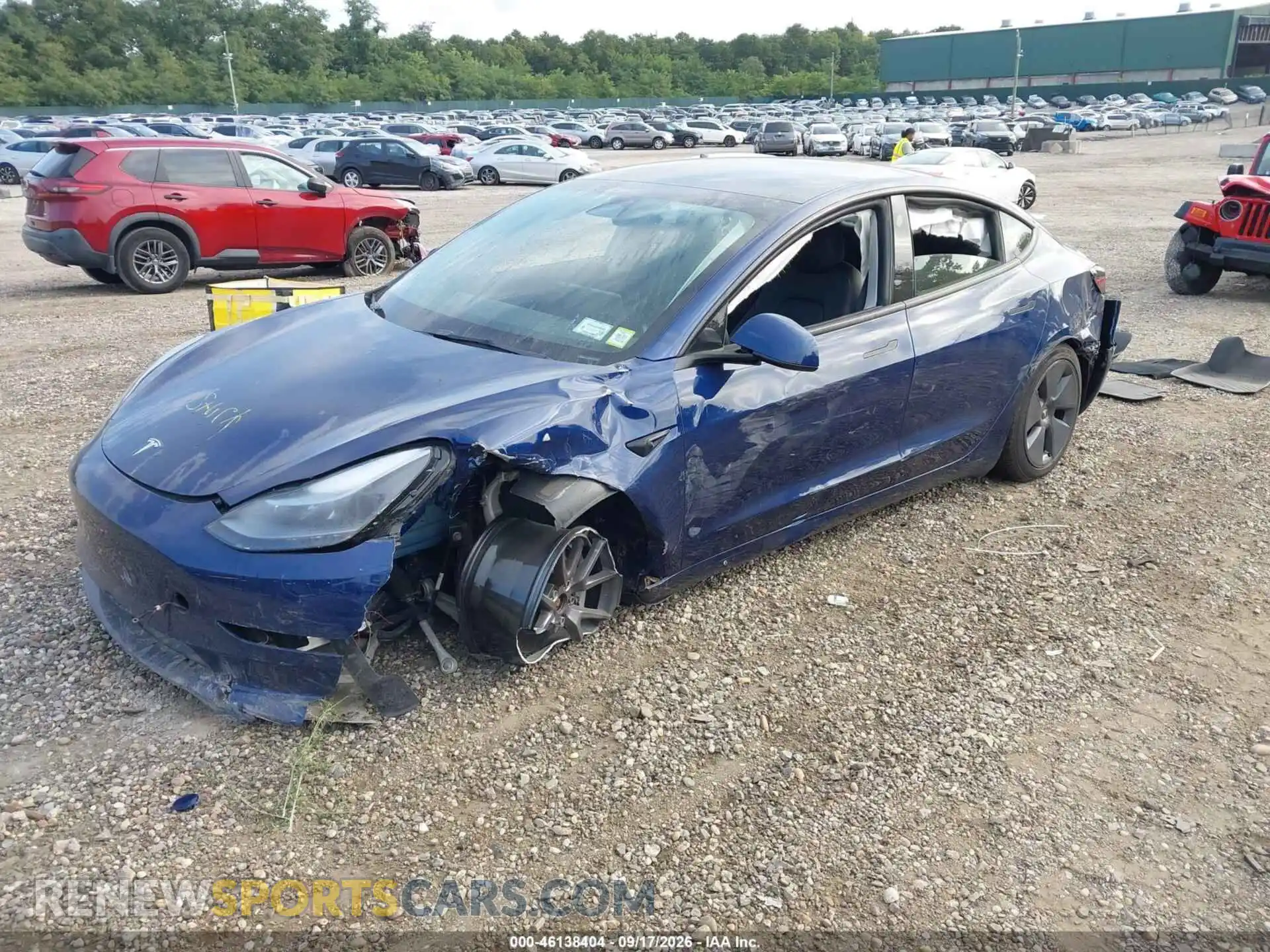 2 Photograph of a damaged car 5YJ3E1EB0NF165182 TESLA MODEL 3 2022