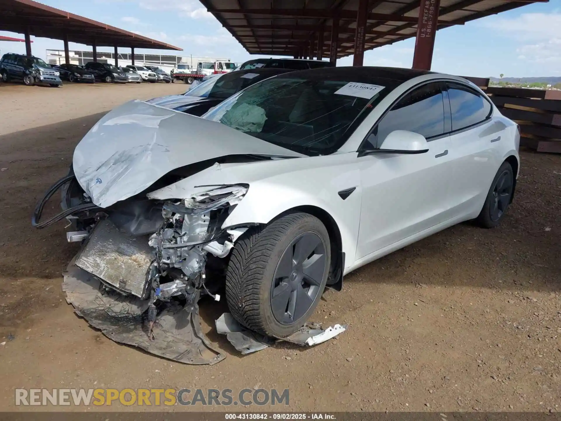 2 Photograph of a damaged car 5YJ3E1EB0NF256324 TESLA MODEL 3 2022