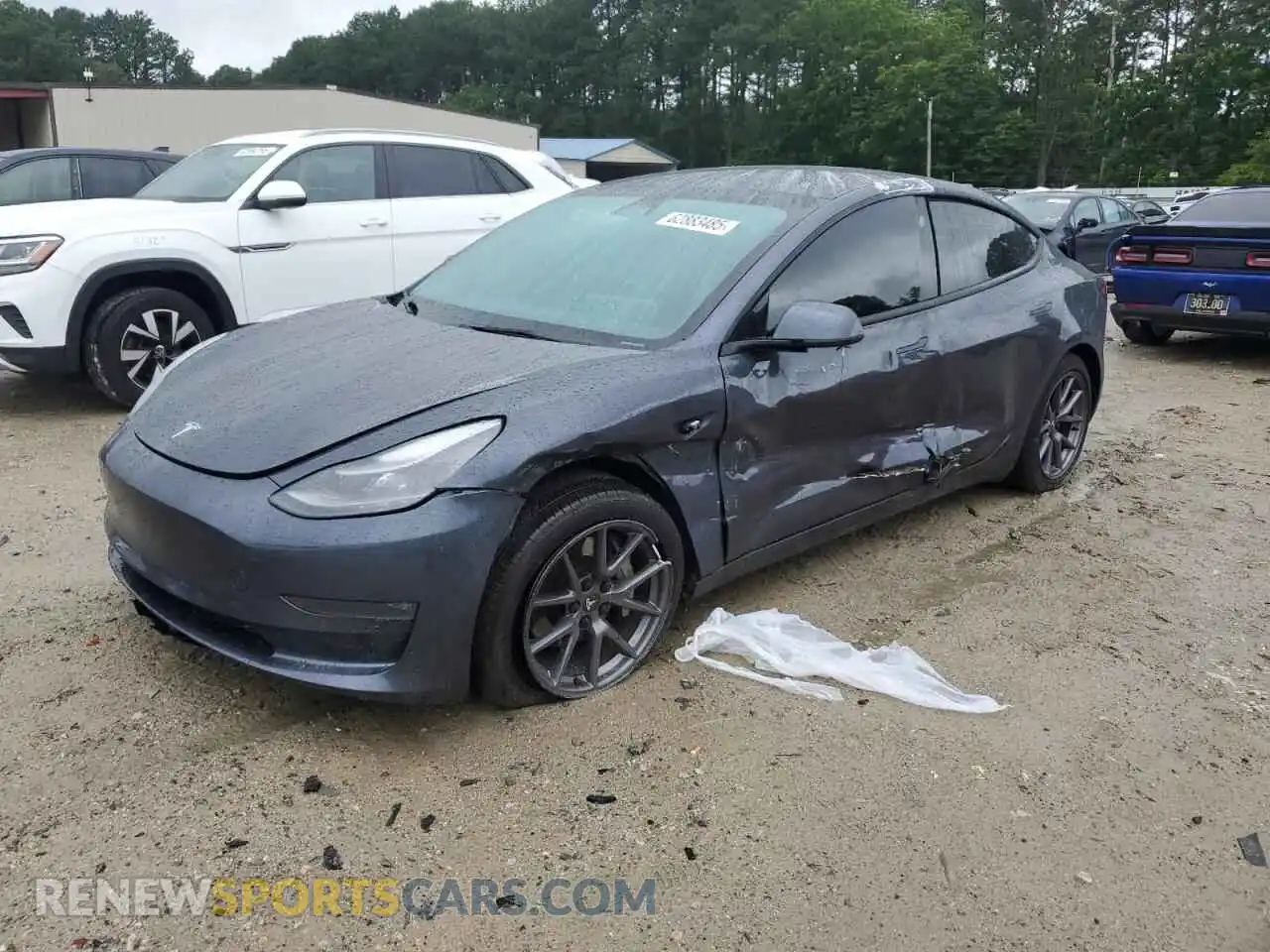 1 Photograph of a damaged car 5YJ3E1EB0NF308390 TESLA MODEL 3 2022