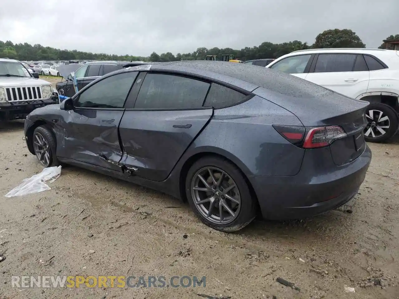 2 Photograph of a damaged car 5YJ3E1EB0NF308390 TESLA MODEL 3 2022