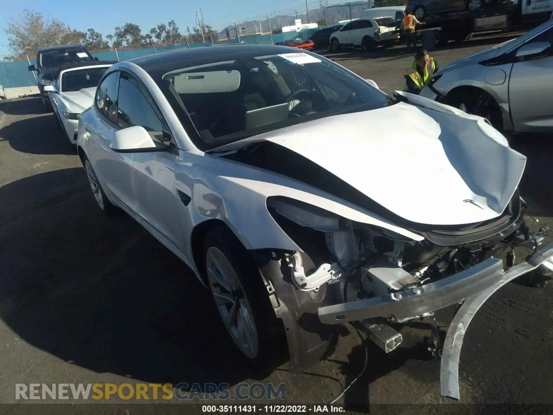 1 Photograph of a damaged car 5YJ3E1EB0NF317428 TESLA MODEL 3 2022