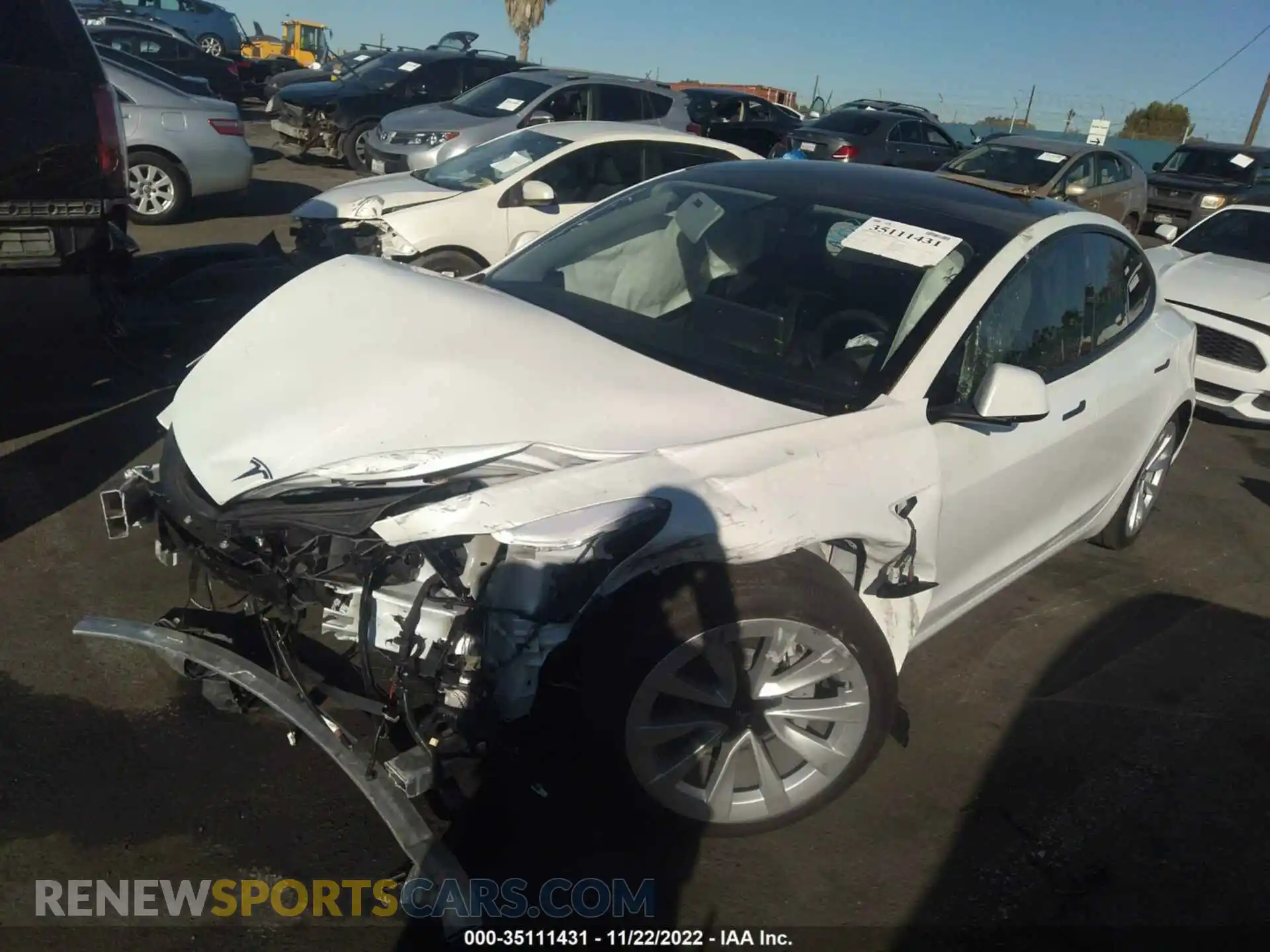 2 Photograph of a damaged car 5YJ3E1EB0NF317428 TESLA MODEL 3 2022