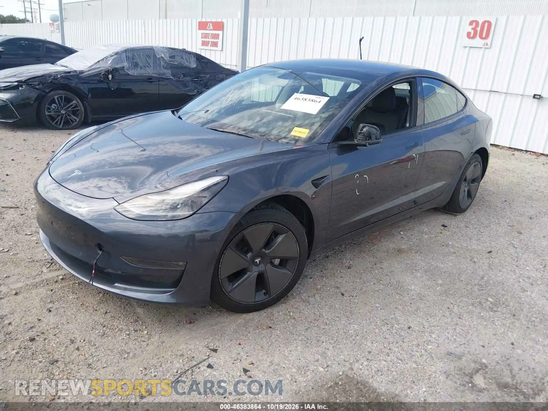 2 Photograph of a damaged car 5YJ3E1EB0NF325917 TESLA MODEL 3 2022