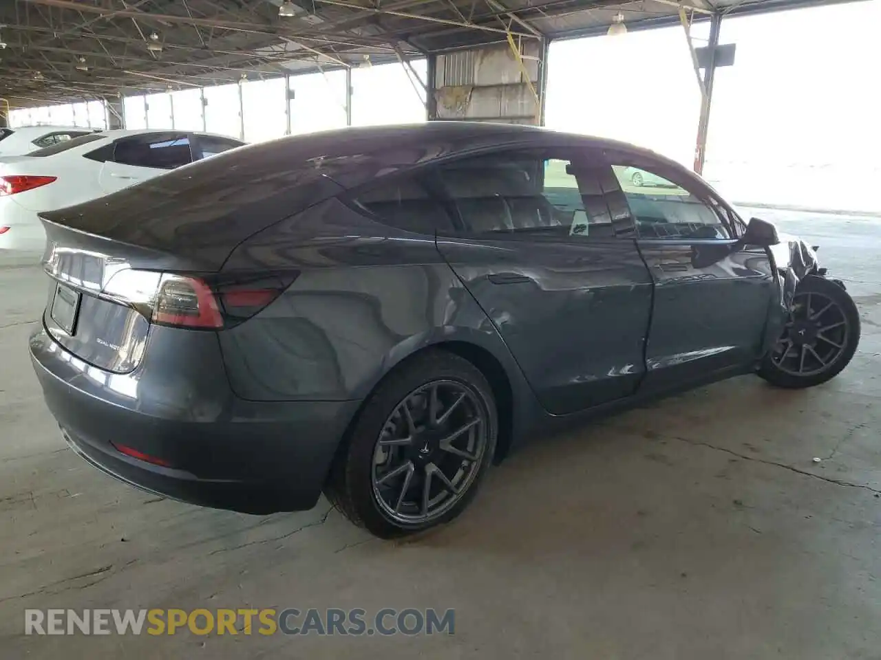 3 Photograph of a damaged car 5YJ3E1EB0NF335427 TESLA MODEL 3 2022