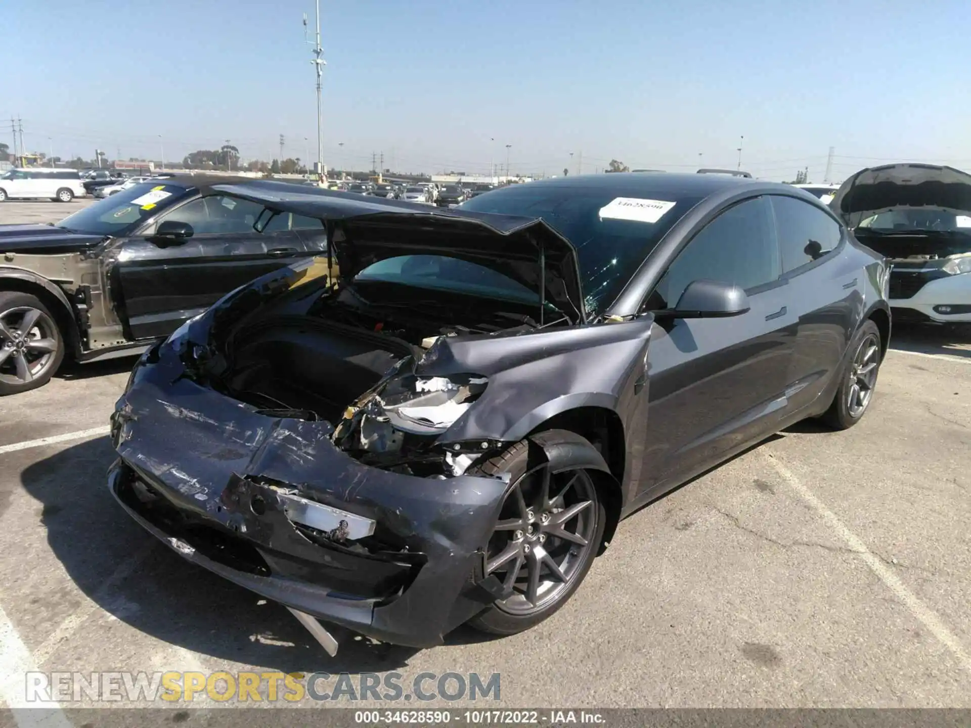 2 Photograph of a damaged car 5YJ3E1EB0NF341017 TESLA MODEL 3 2022