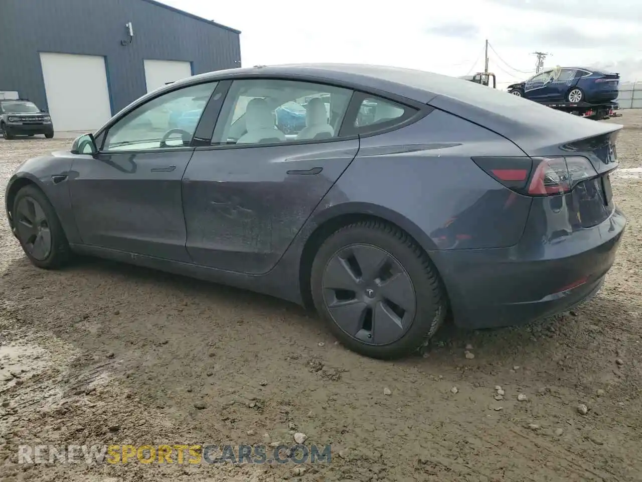 2 Photograph of a damaged car 5YJ3E1EB0NF352700 TESLA MODEL 3 2022