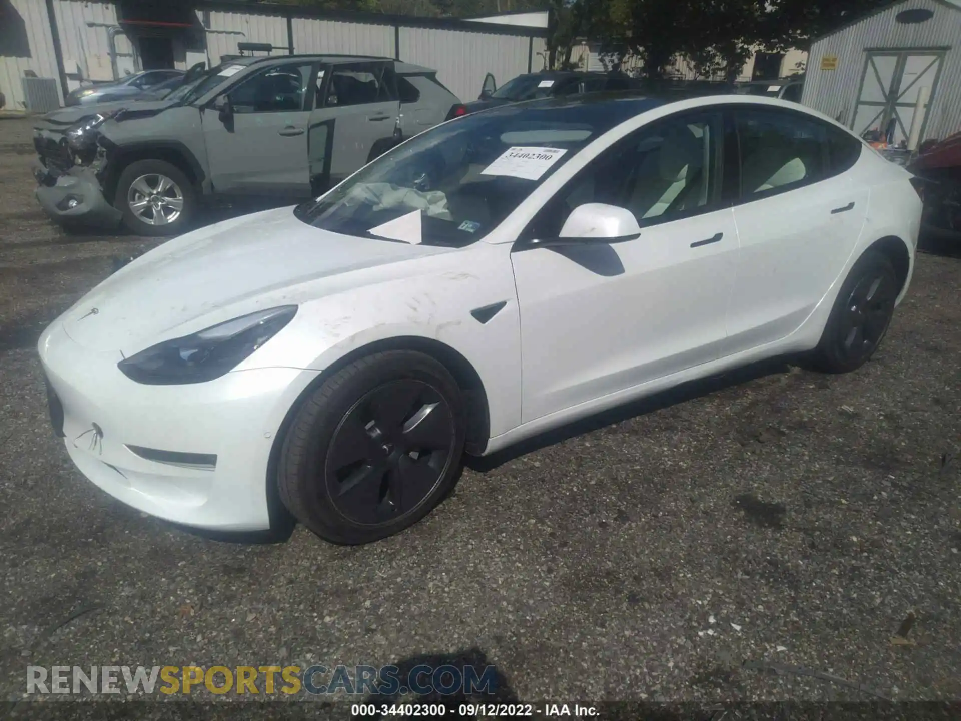 2 Photograph of a damaged car 5YJ3E1EB1NF119232 TESLA MODEL 3 2022