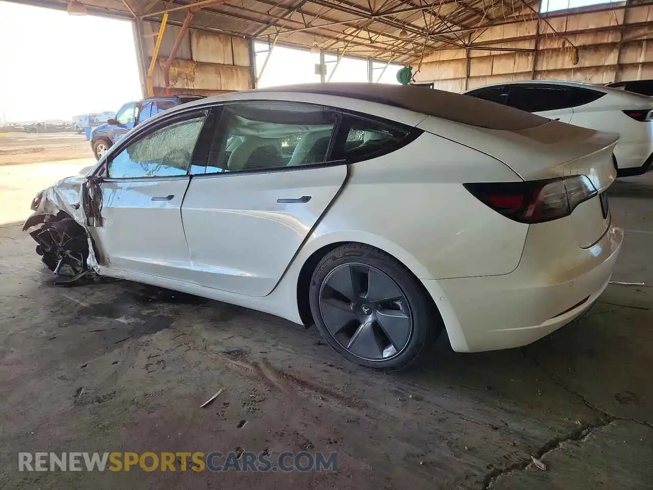 2 Photograph of a damaged car 5YJ3E1EB1NF135107 TESLA MODEL 3 2022