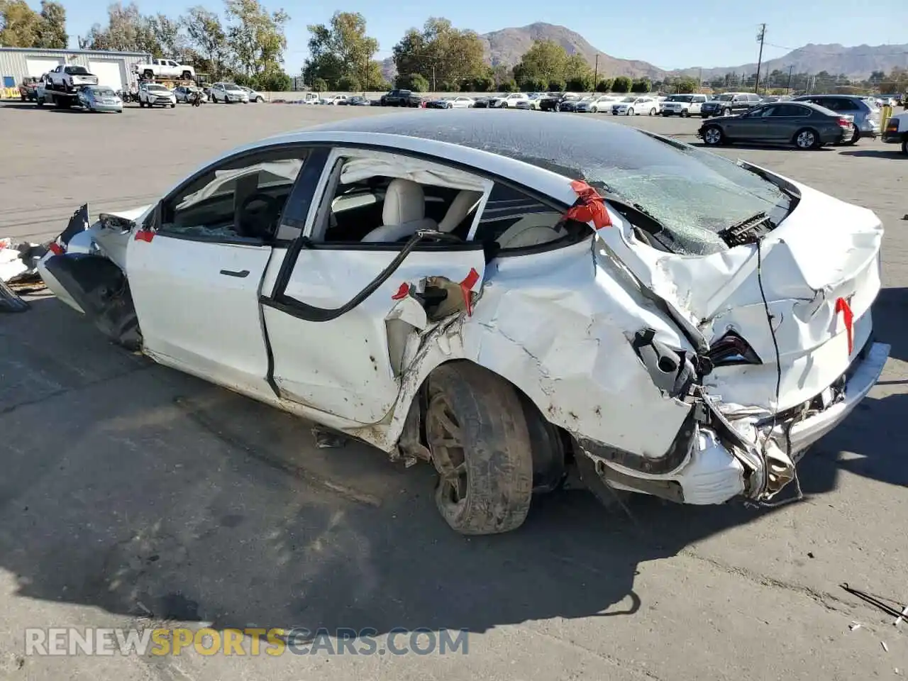 2 Photograph of a damaged car 5YJ3E1EB1NF136192 TESLA MODEL 3 2022