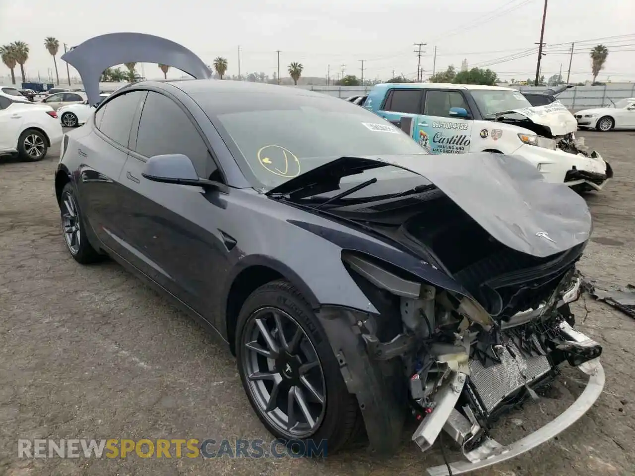 1 Photograph of a damaged car 5YJ3E1EB1NF137133 TESLA MODEL 3 2022