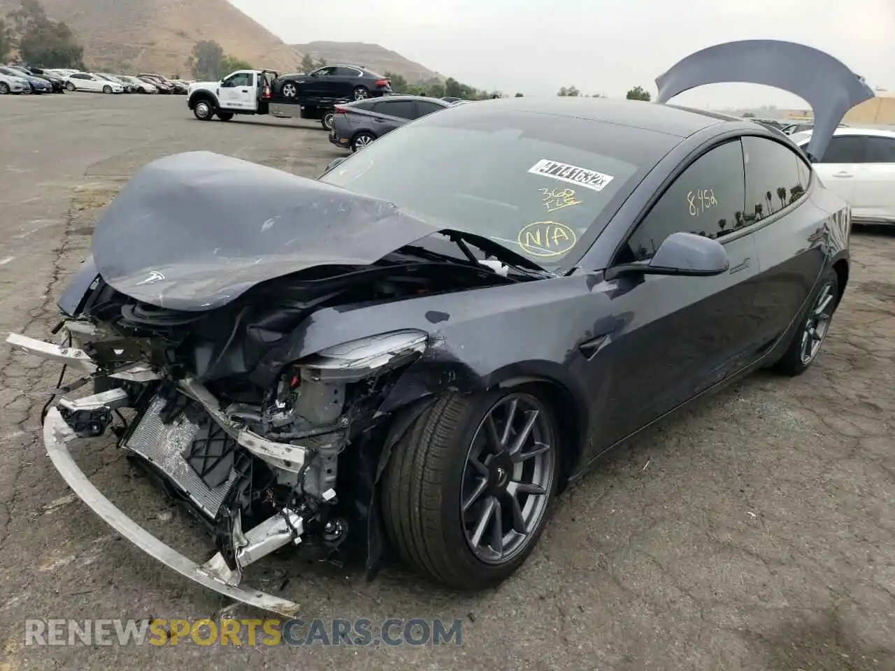 2 Photograph of a damaged car 5YJ3E1EB1NF137133 TESLA MODEL 3 2022