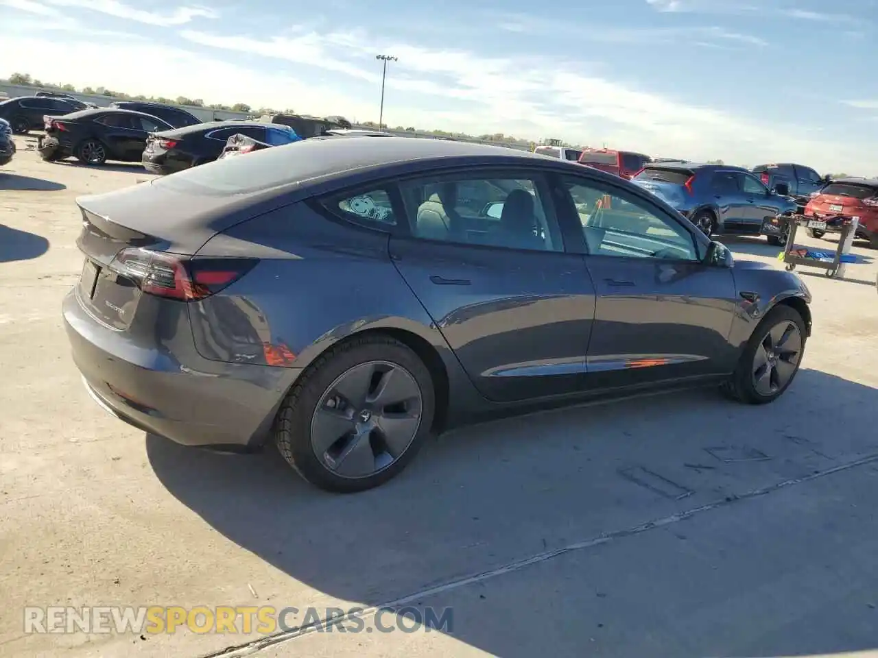 3 Photograph of a damaged car 5YJ3E1EB1NF171895 TESLA MODEL 3 2022